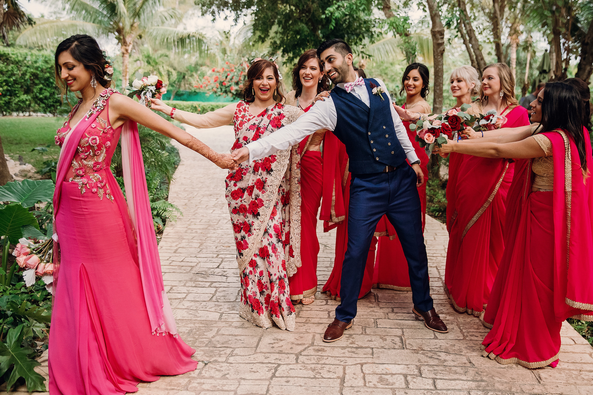 Funny scenes with bridesmaids trying to keep Hindu bride away from groom